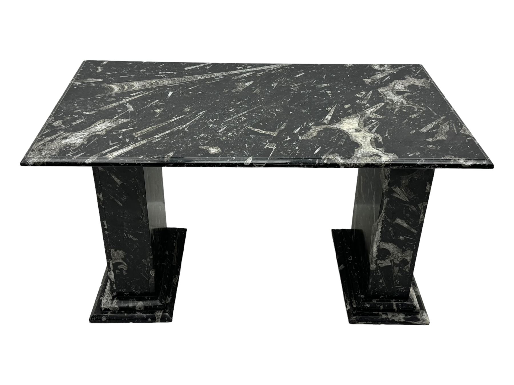 Marble hall table with orthoceras and goniatite inclusions, the rectangular top upon two rectangular stepped plinths, H78cm, L135cm, D77cm