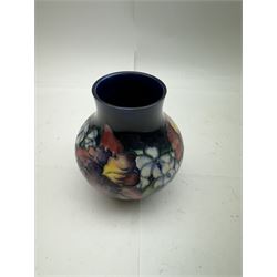 Moorcroft vase of squat baluster form in Orchid pattern H14cm