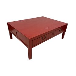 Chinese design red lacquered coffee table, rectangular form on square tapering supports, fitted with two drawers 