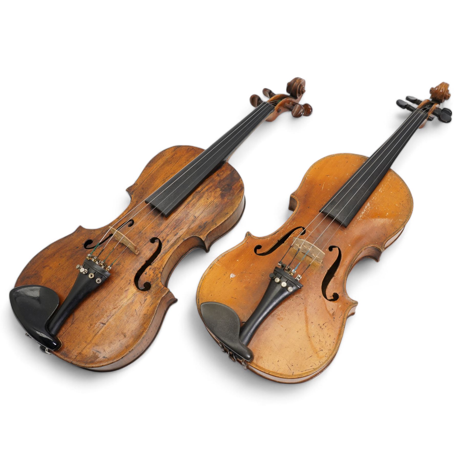 Two violins, both full size and unlabelled, one with bow and both cased