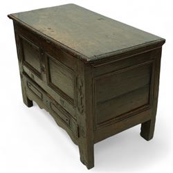 Small 18th century oak mule chest, rectangular hinged top top with moulded edge, enclosing candle box, over a double panelled front flanked by foliate carvings, single drawer fitted to base, on stile supports