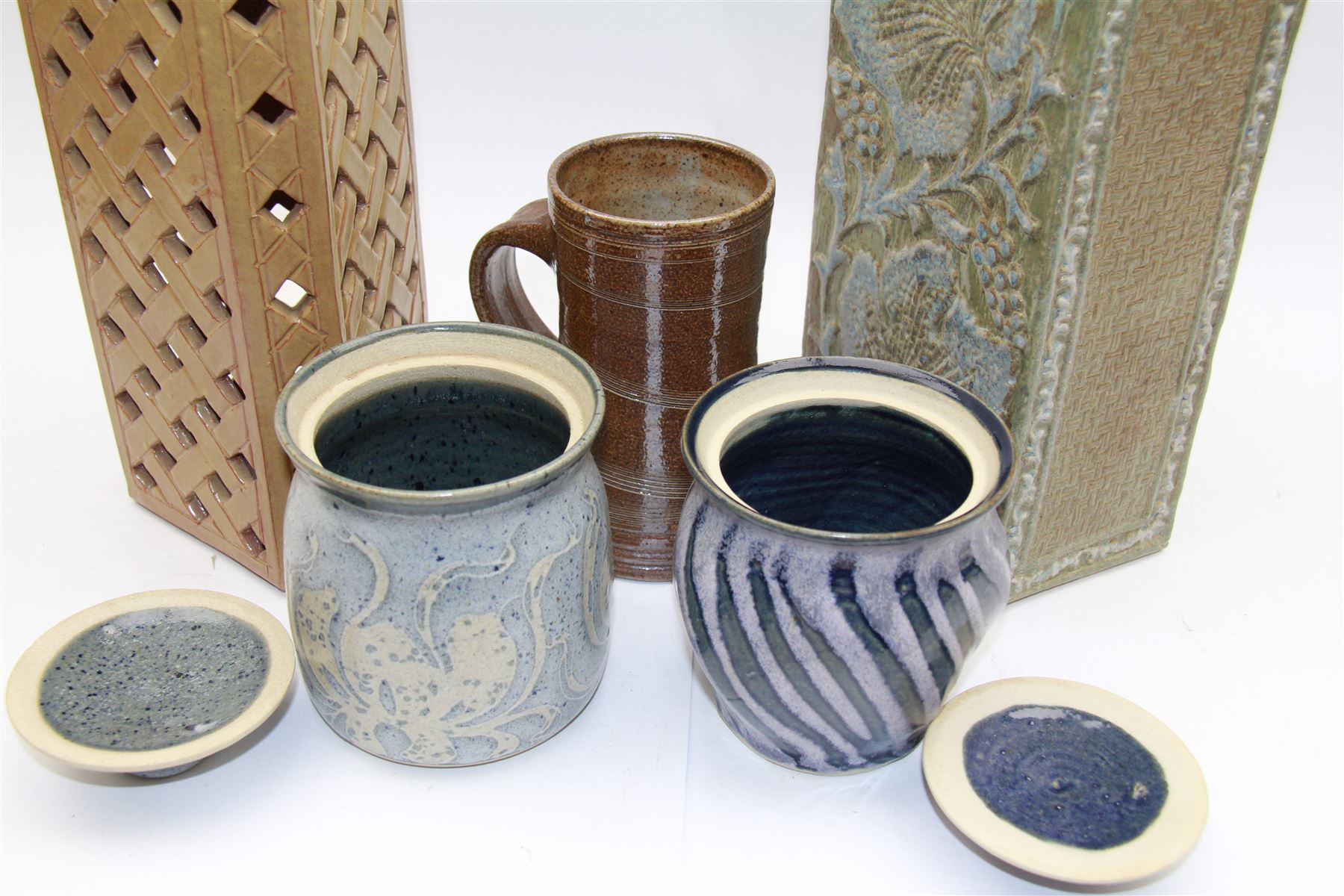 Jane Hamlyn studio pottery tankard and two John Egerton tea caddies, together with two studio pottery lamp bases, largest lamp base H34cm