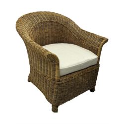 Rattan armchair and ottoman set, pair of armchairs featuring rounded backrests with wide armrests, woven wicker frame with weaving and upholstered seat cushions in off-white fabric with flowing floral pattern (W83 D80 H78cm); matching round ottoman with upholstered cushion on square wooden feet (W65 D65 H37cm)