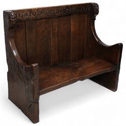 Mouseman - circa. 1920s adzed oak settle or bench, the cresting rail carved with inscripti...