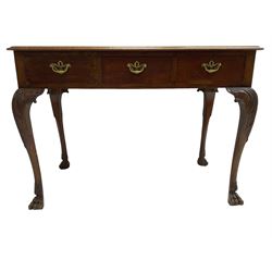 Late 19th century mahogany side table, moulded rectangular top over three drawers, pierced brass handle plates with swan neck handles, on acanthus carved cabriole supports with paw carved feet