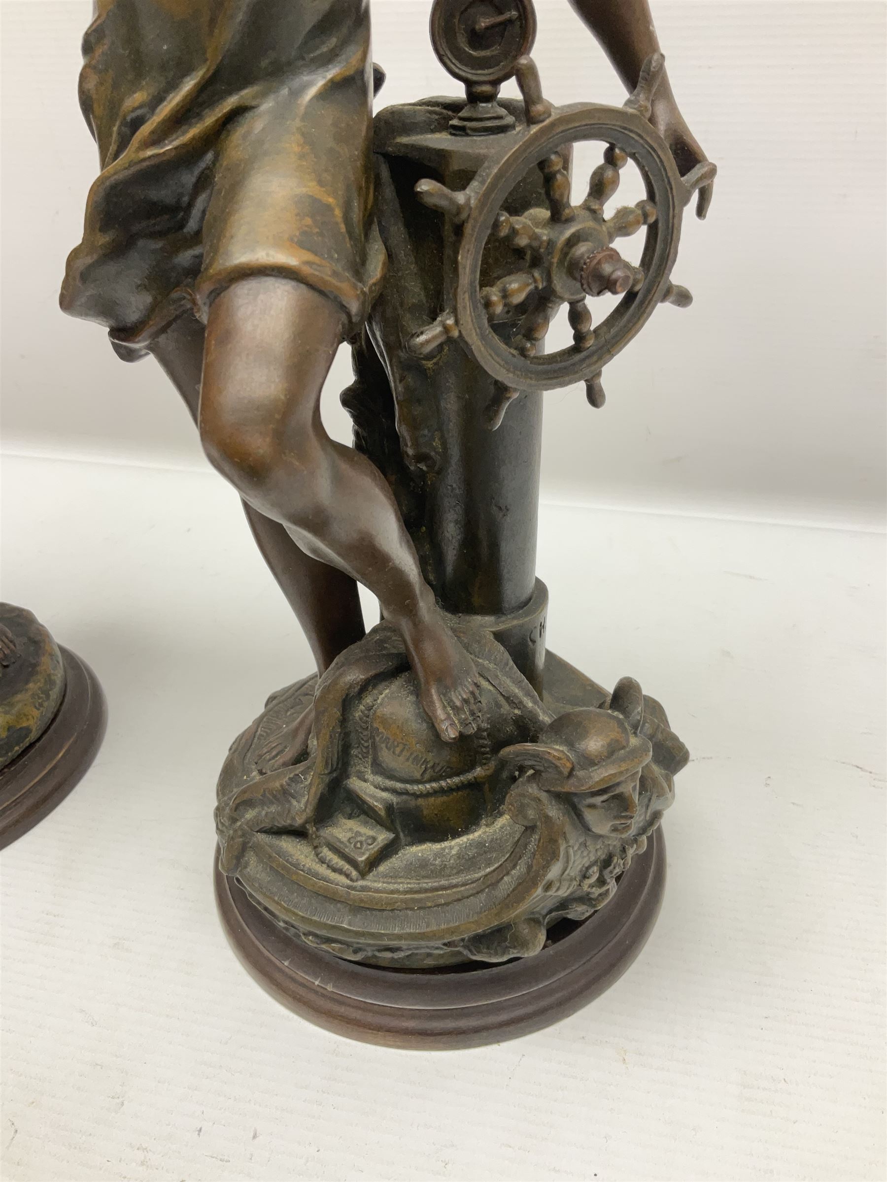 After Charles Octave Levy, pair of bronzed spelter figures, 'Industrie' and 'Commerce', upon stepped wooden plinth, H42cm