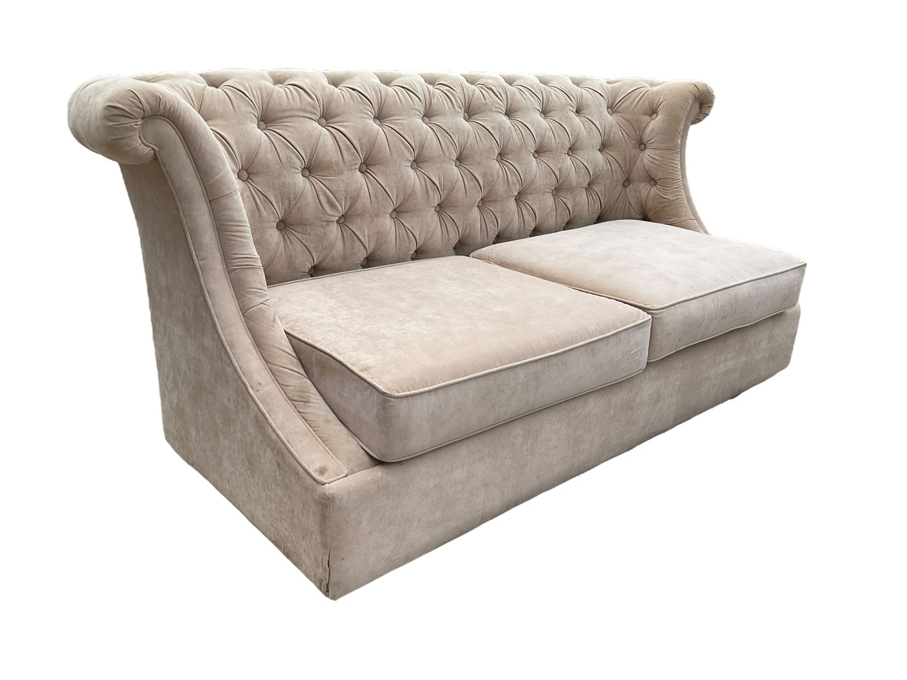 Grande wing back sofa bed, upholstered in beige buttoned fabric, metal action pull out double bed