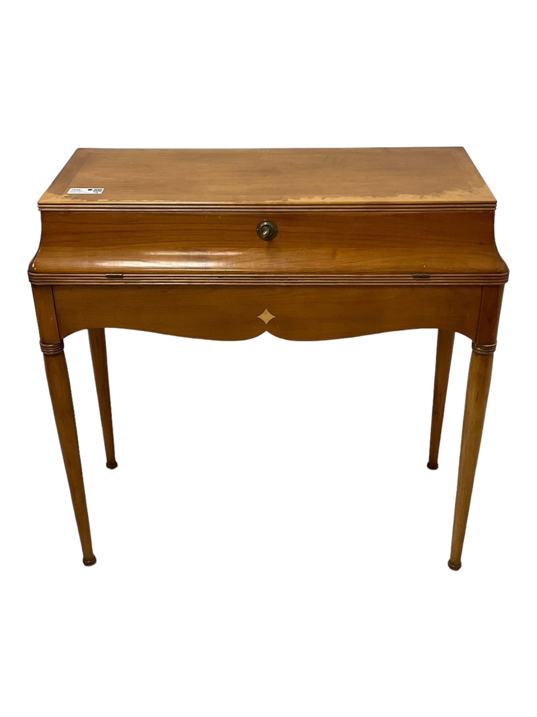 French design cherry wood dressing table, reed moulded hinged lid reveals mirror back, central compartment with lid and divisions, on turned supports