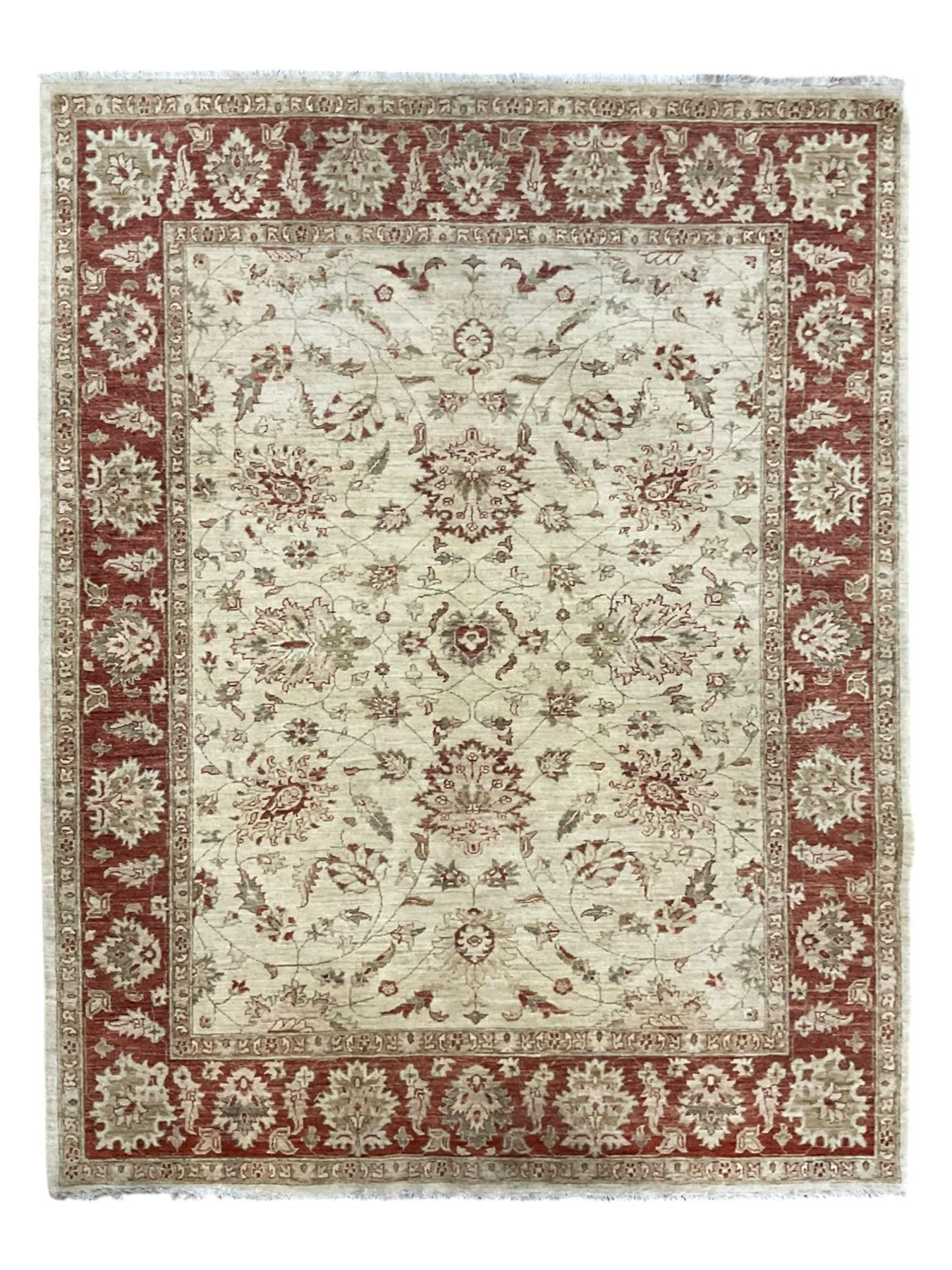 Persian Zeigler beige ground rug, the field decorated with large palmette motifs interconnected with scrolling foliate and branches, enclosed by a wide crimson guard band with repeating stylised plant motifs