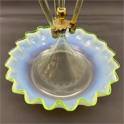 Victorian Vaseline glass epergne, the frilled circular bowl supporting a central frilled trumpet, flanked by three smaller trumpets, H58cm