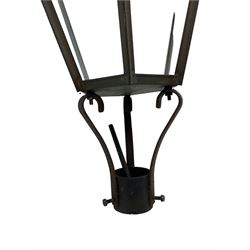 Victorian design six glass lantern, hexagonal tapered from with finial, scrolled lower supports on bracket