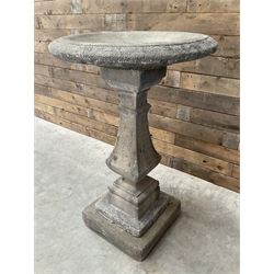 Cast stone garden bird bath, circular dished top, raised on square tapering column, on stepped base with separate mounting plinth