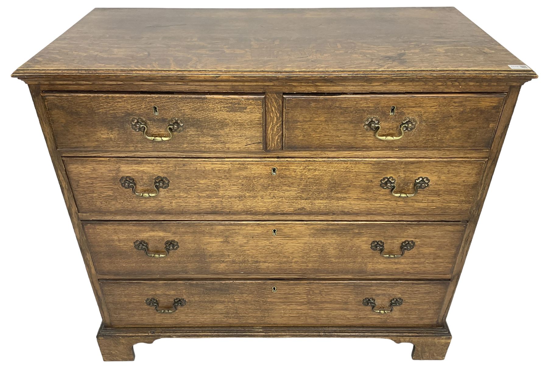 Early 20th century Georgian design oak chest, fitted with two short over three long drawers, lower moulded edge over bracket feet