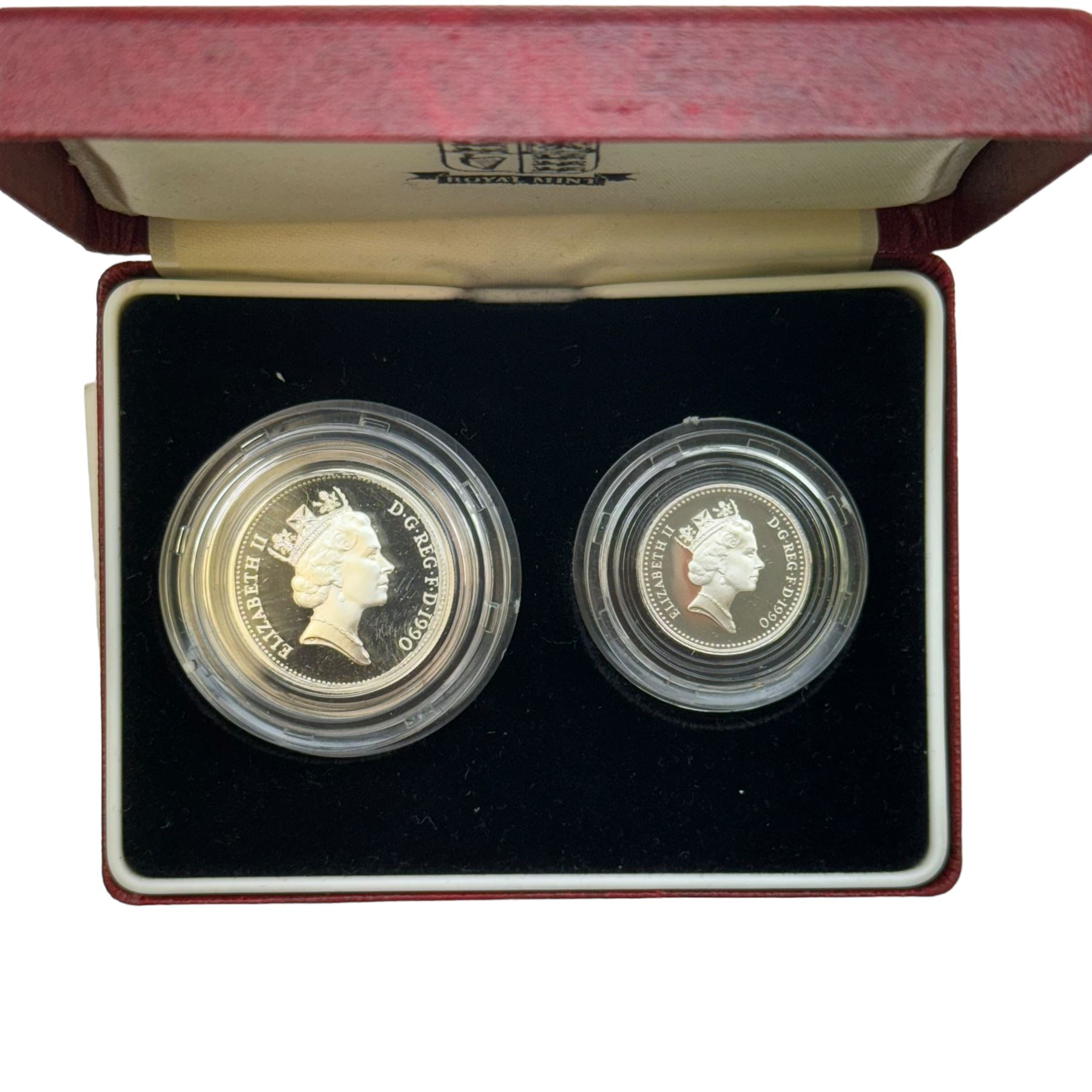 Eight The Royal Mint United Kingdom silver proof coins or sets, comprising two 1990 five pence two-coin sets, two 1992 ten pence two-coin sets, two 1997 two pounds, 2004 '200th Anniversary of the Steam Locomotive' two pounds and 2002 'Golden Jubilee' five pounds, all cased with certificates