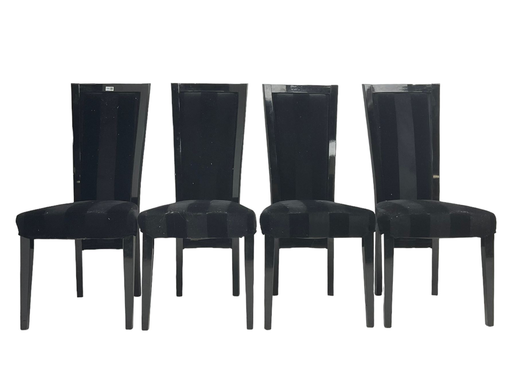 Set of four contemporary ebonised high back dining chairs, upholstered in black velvet fabric