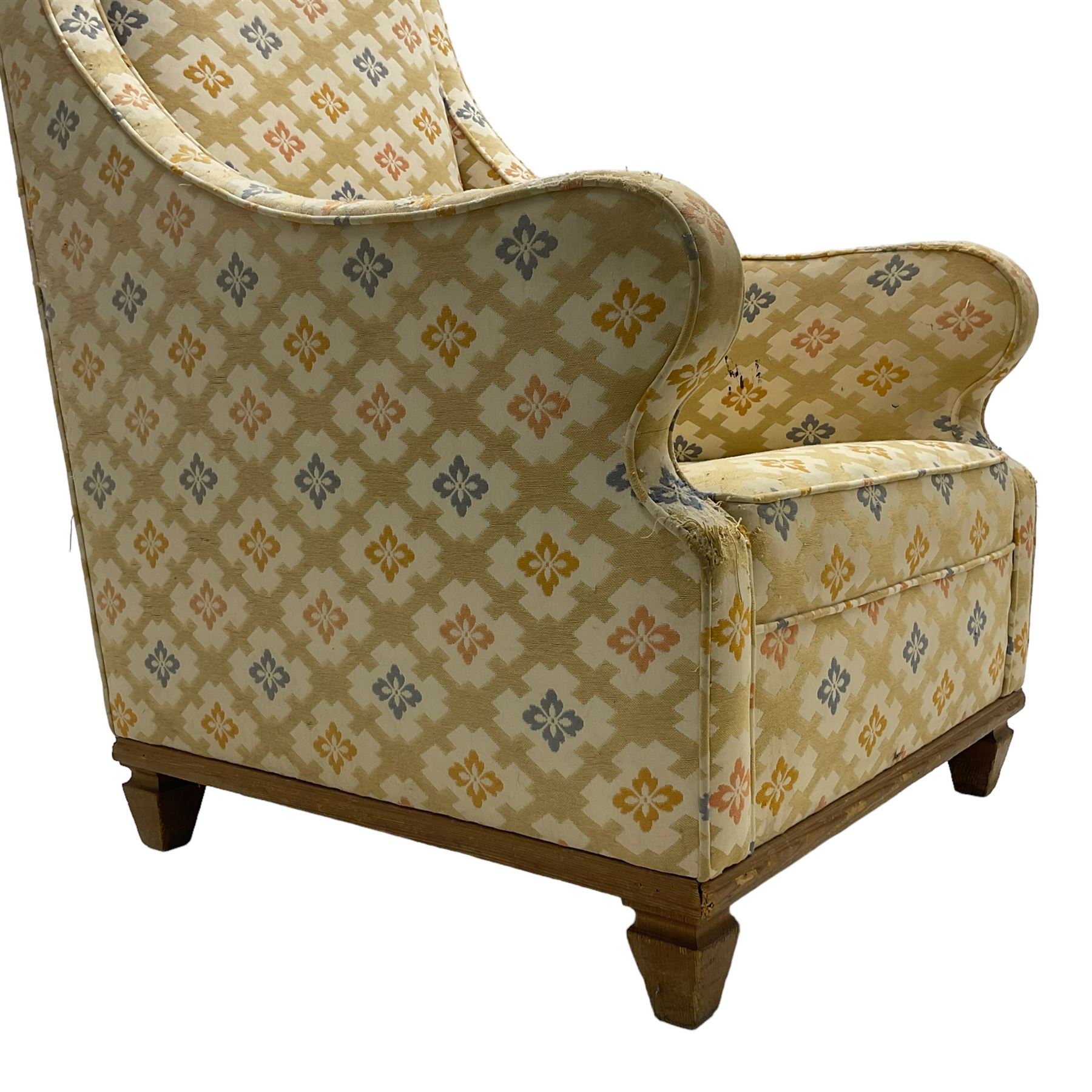 Spanish high back throne armchair, arched cresting rail over scooped arms, upholstered in gold and ivory patterned fabric, on a pitch pine base with spade feet