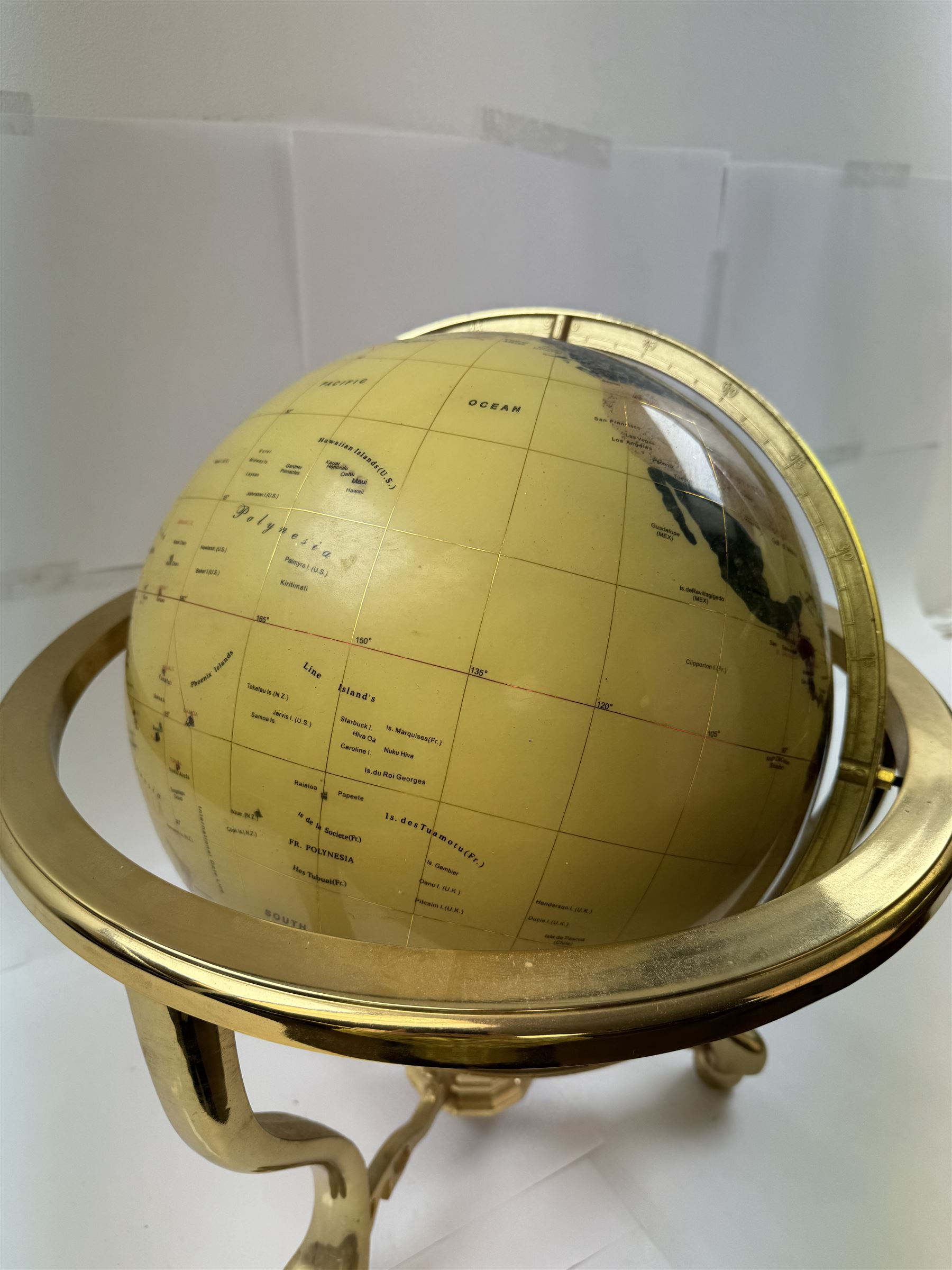 Polished gemstone terrestrial globe on gilt metal stand, H47cm