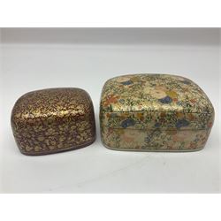 Nine lacquered boxes, all rectangular form, including russian examples decorated with animals within a stylized landscapes and example with flower decoration, largest H7cm, L11cm