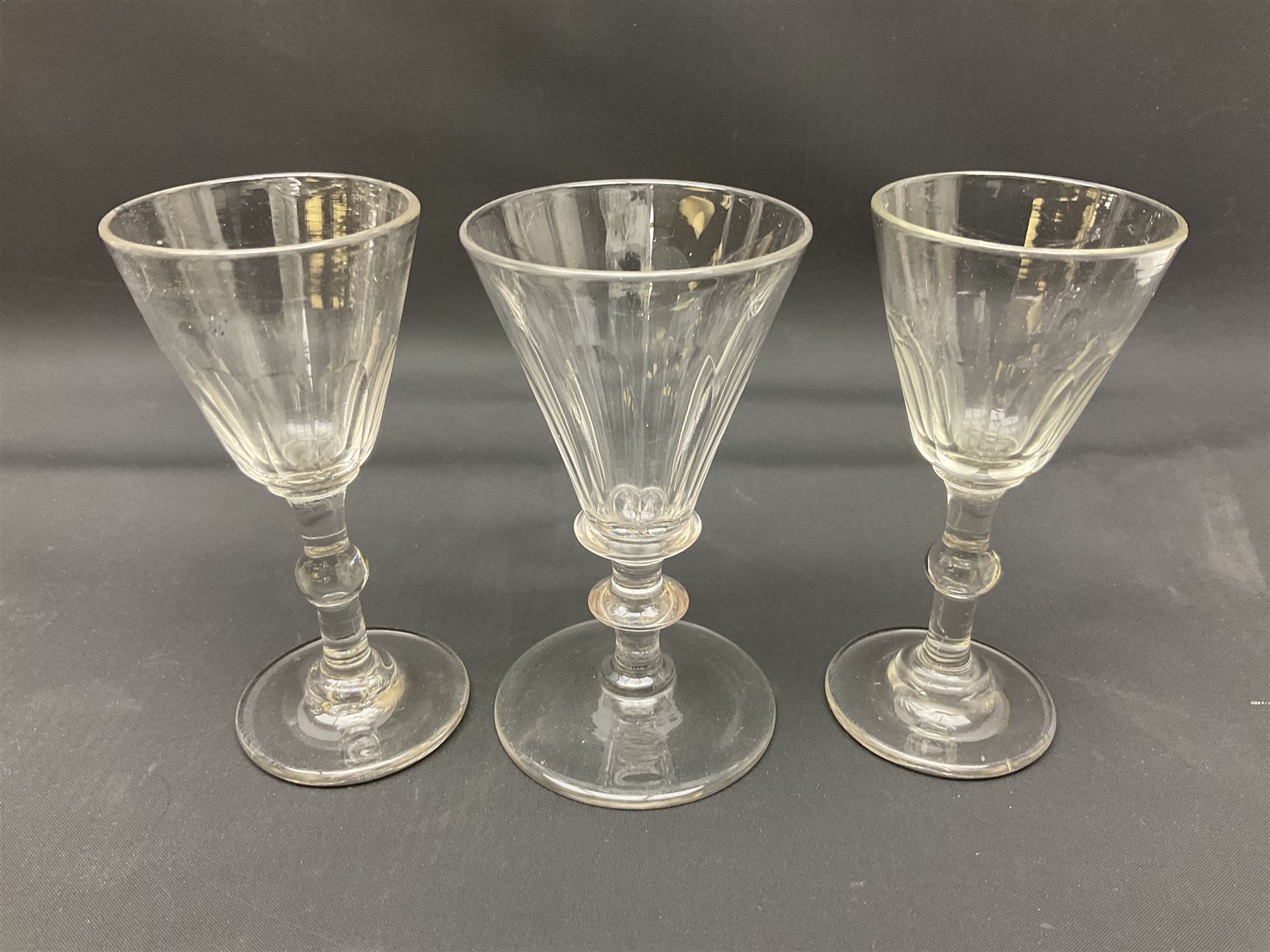 Collection of 18th century and later glassware, including set of three with twist stems and etched and fluted examples