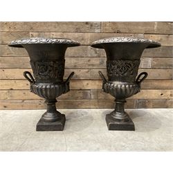 Pair of Victorian design cast iron garden urns, egg and dart border, floral column fitted ...