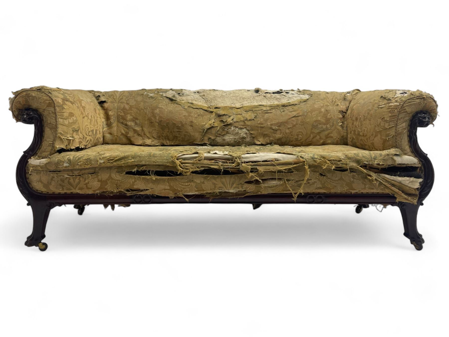 19th century mahogany settee, rolled S-scrolled arms carved with lion masks and acanthus leaf scrolls, the lower moulded rail carved with scrolling design, raised on carved paw feet with recessed brass and ceramic castors 