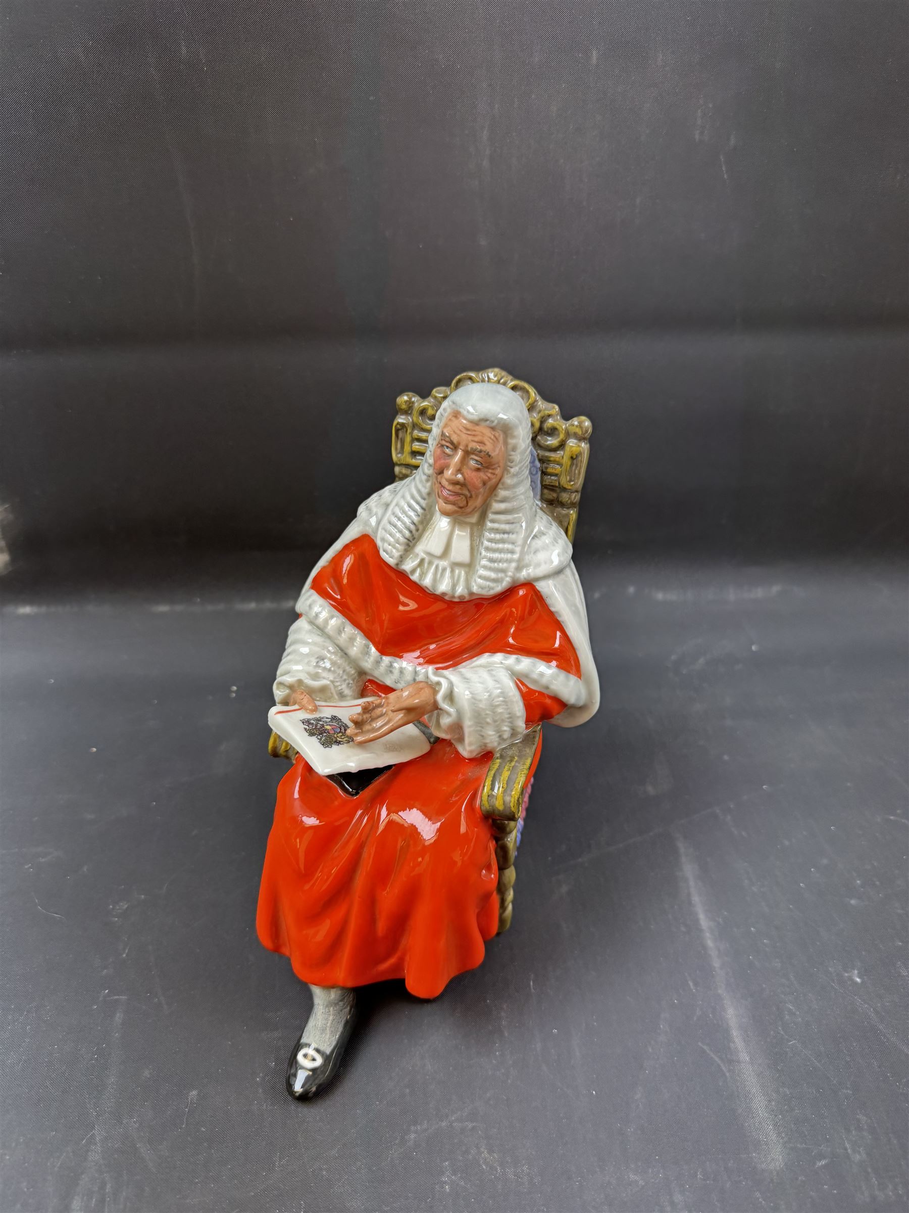 Two Royal Doulton figures, comprising Sir Winston Churchill HN3057 and The Judge HN2443