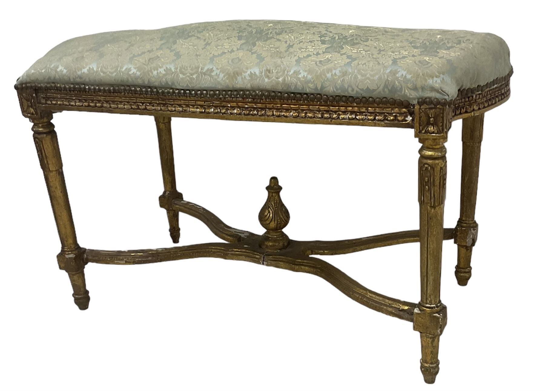 French Louis XIV design giltwood framed bench or window seat, sprung seat upholstered in pale blue foliate damask fabric with studwork border, raised on gesso moulded and carved tapering supports united by curved X-stretcher, with central acanthus carved finial