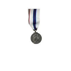 ER ll Coronation Medal, together with ribbons etc 