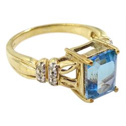 9ct gold blue topaz ring, with white topaz shoulders, hallmarked