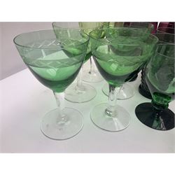 Set of four Swedish Reijmyre drinking glasses, with textured outer surface, together with green drinking glasses including Holmegaard examples and other glassware