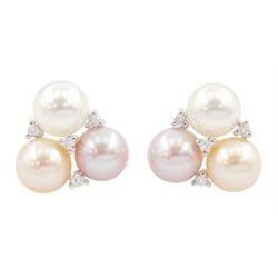 Pair of 18ct white gold three stone peach, pink and white pearl and round brilliant cut diamond cluster stud earrings, Edinburgh 2006