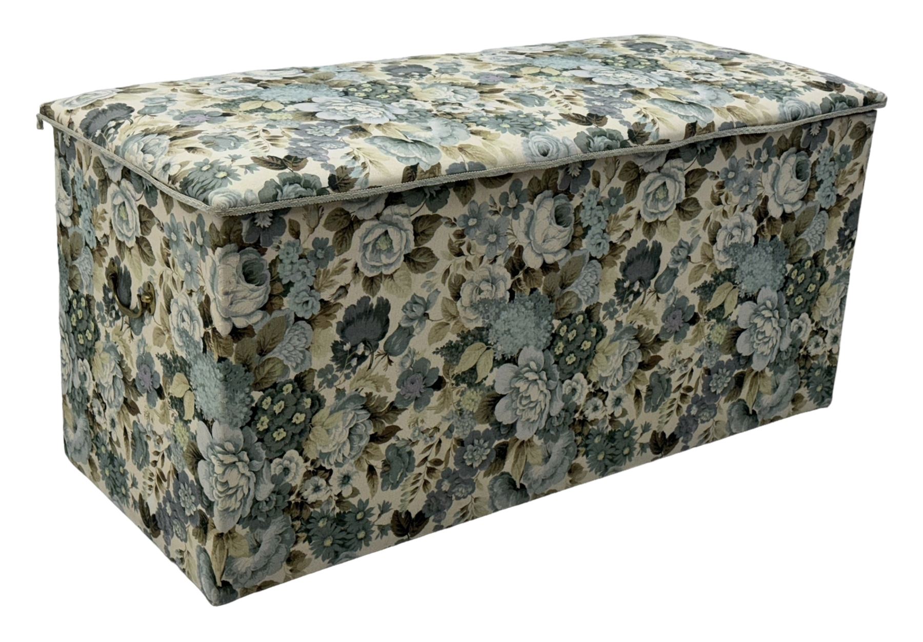 Mid 20th century oak blanket box, upholstered in floral pattern fabric, padded hinged lid enclosing oak interior with two removable trays, brass side handles, on round metal supports