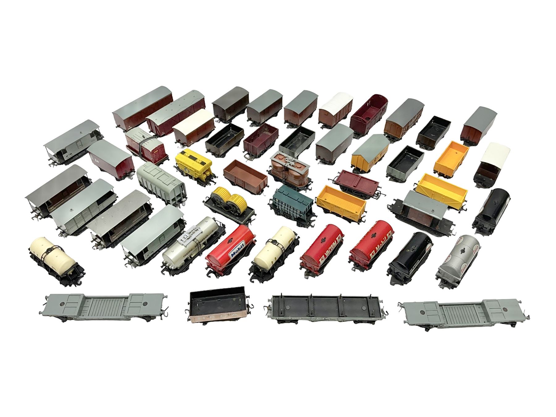 Hornby Dublo - forty-three goods wagons including nine tank wagons (Esso, Mobil, Vacuum, UD and Traffic Services), brake vans, meat and fish wagons, bogie well and bolsters, cable drums, open wagons, salt and grain wagons, etc; and six others by Tri-ang etc; all unboxed (49)