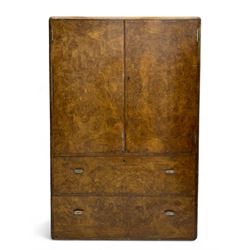 Early 20th century burr walnut cabinet, rectangular top with raised back, over double-door cupboard enclosing camphor interior with single shelf, lower section fitted with two drawers