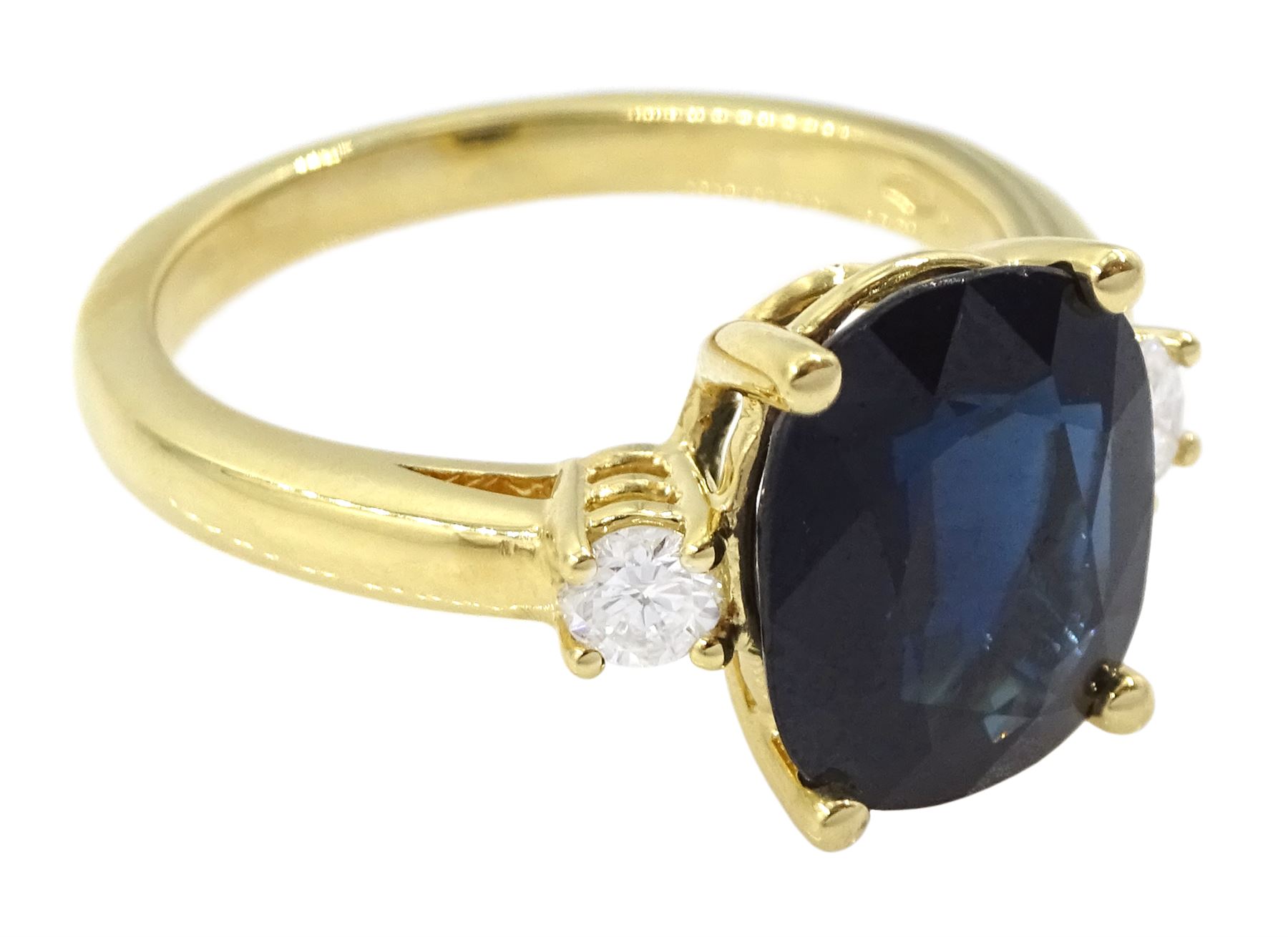 18ct gold three stone sapphire and round brilliant cut diamond ring, hallmarked, sapphire approx 3.95 carat