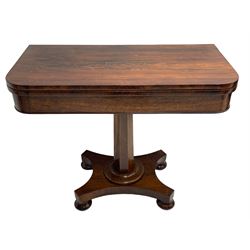 Early Victorian rosewood card table, rectangular swivel and fold-over top with rounded corners, baize lined interior, tapered octagonal column on concaved rectangular platform, on four turned feet 