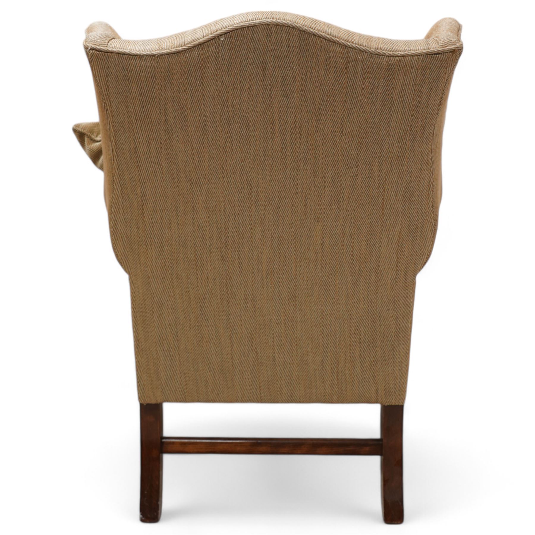 Georgian design wingback armchair, upholstered in brown herringbone fabric, on square moulded supports united by plain H-stretchers