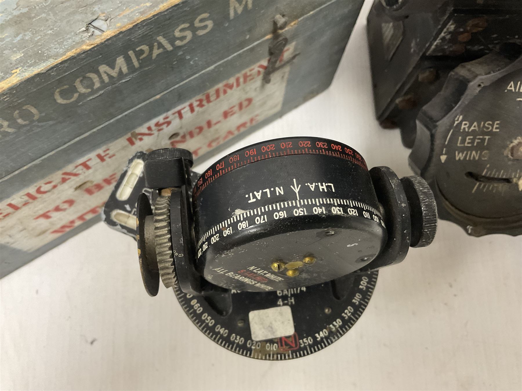 Cased Astro compass mark MK11, together with another and other aircraft equipment marked Aero Controls Ltd 