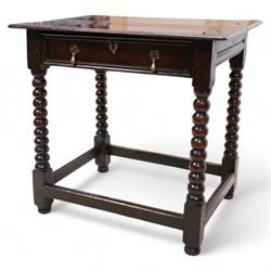 17th century oak side table, rectangular two-plank top with moulded edge, over a single dr...