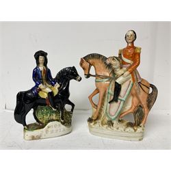 Staffordshire figure of the Duke of Wellington on a bay horse, H30cm in red uniform, together with a similar Staffordshire figure of Dick Turpin, pair of Staffordshire style dogs, H27cm, three Meissen style double salts and two trinket boxes 