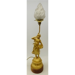  Art Nouveau style gilt painted spelter figural table lamp of a female tambourine player with glass flambe shade and turned hardwood base, H80cm  
