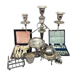 Silver plate, including three branch candelabra, cased set of coffee bean spoons, toast rack, etc 