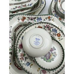 Large collection of Spode Chinese Rose pattern tea and dinner wares, including tureens, dinner plates, side plates, coffee pot, jars, cooking pots, sauce boats, jugs, soup bowls, ramakins, teacups and saucers, etc
