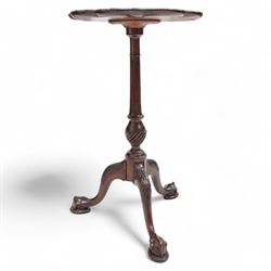 Georgian design mahogany wine table, circular dished top with moulded scalloped edge, raised on a fluted pedestal with spiral reeded decoration, tripod base with splayed supports carved with acanthus leaves, terminating to ball and claw feet 