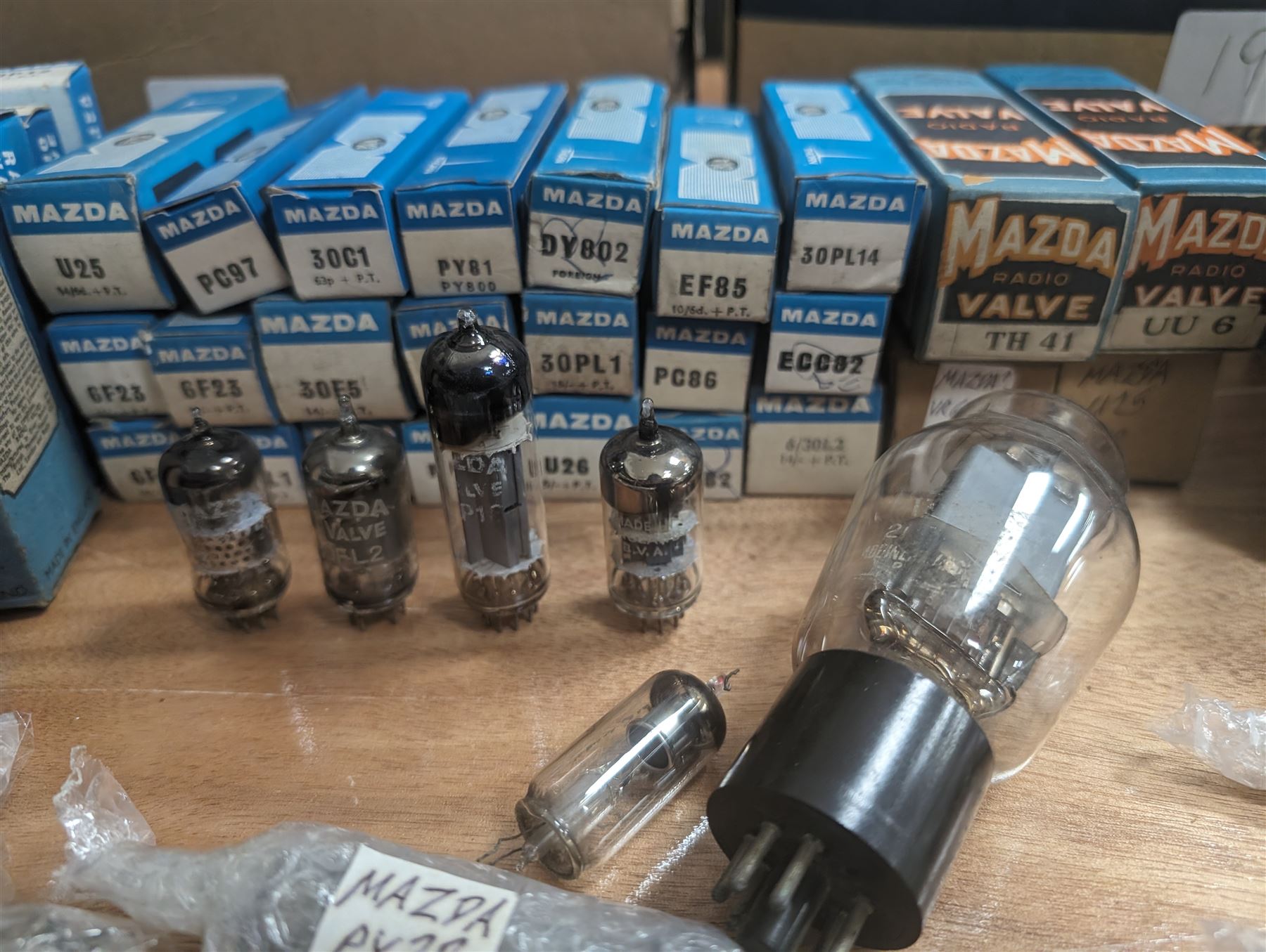 Large collection of Mazda thermionic radio valves/vacuum tubes, including boxed examples and loose bubble wrapped and identified examples