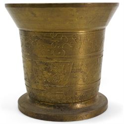 19th century Eastern bronze pestale and mortar, together with an earlier bronze mortar, H11cm (3)