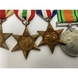 WWII group of six medals comprising 1939-45 Star, The Africa Star, The Italy Star, France and Germany Star, Defence Medal and War Medal 1939-45, awarded to 7899181 RAC C.W Hughes, together with two chevrons and ephemera relating to Charles William 'Bill' Hughes including Soldier's Release Book, photographs, certificates of transfers etc 