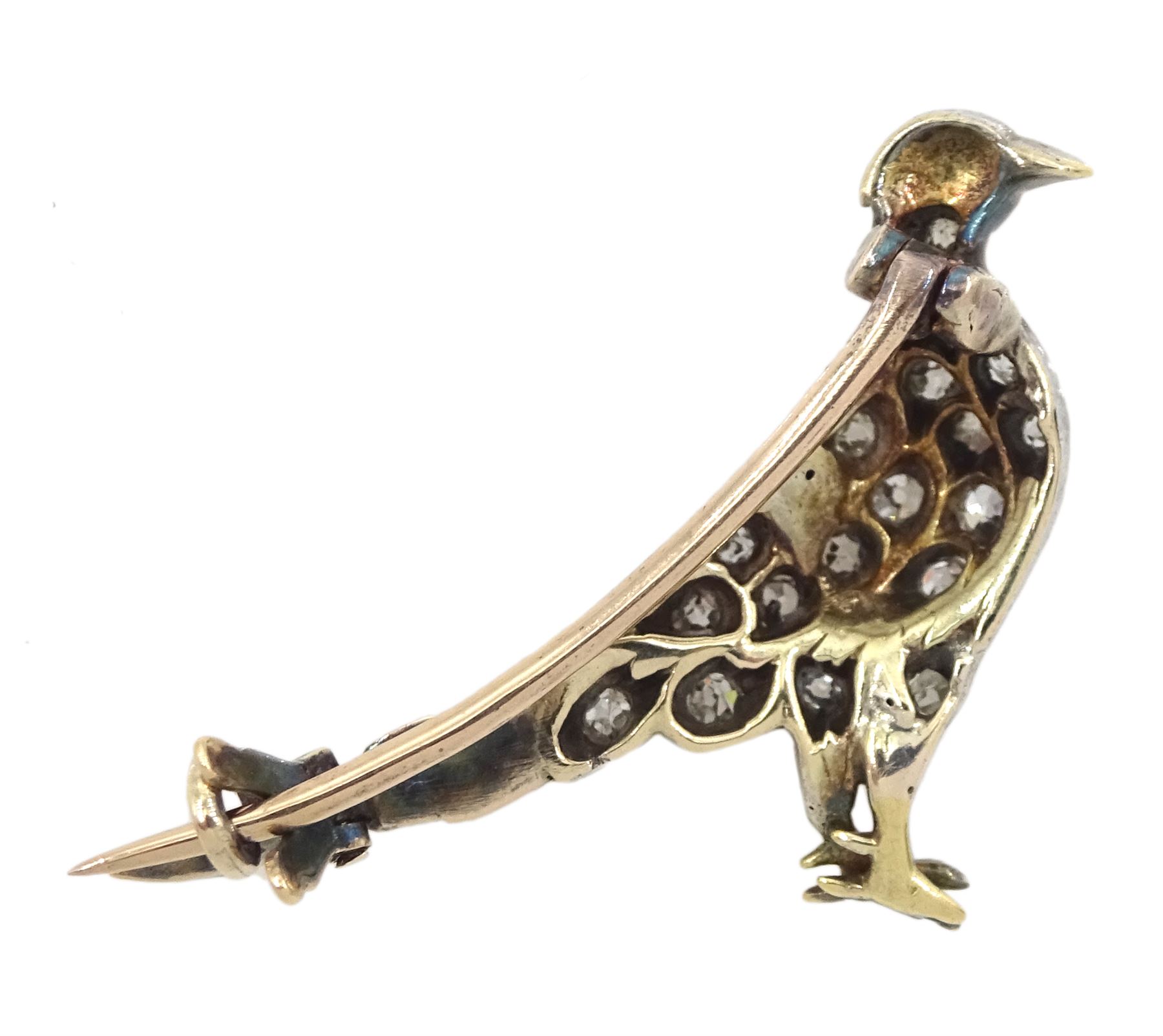 Victorian silver and gold diamond pheasant brooch, old and rose cut diamond body and a ruby set eye