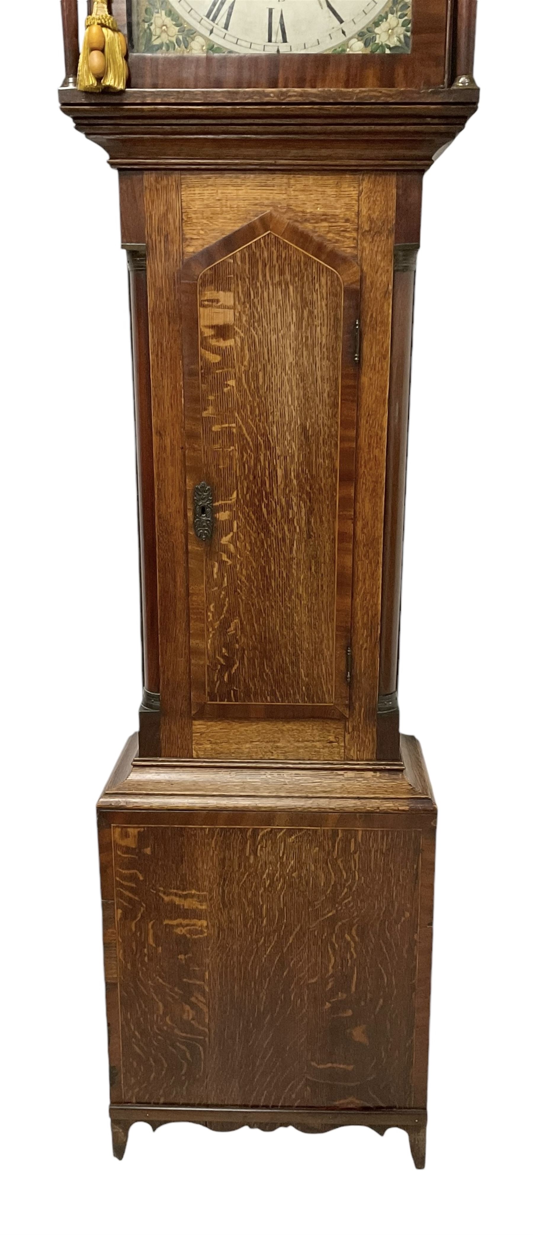 Dixon of Hexham - 19th century oak and mahogany 30-hour longcase clock, with a flat top and break arch hood door beneath, trunk with canted corners and a pointed top door, on a rectangular plinth with a shaped base, painted  dial with floral spandrels and a Father Time automaton to the arch, with Roman numerals, seconds and date dials and brass hands, dial pinned via a false plate to a chain driven countwheel striking movement, striking the hours on a bell. With pendulum and weight.