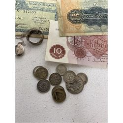 Silver locket and ring, coins and banknotes 